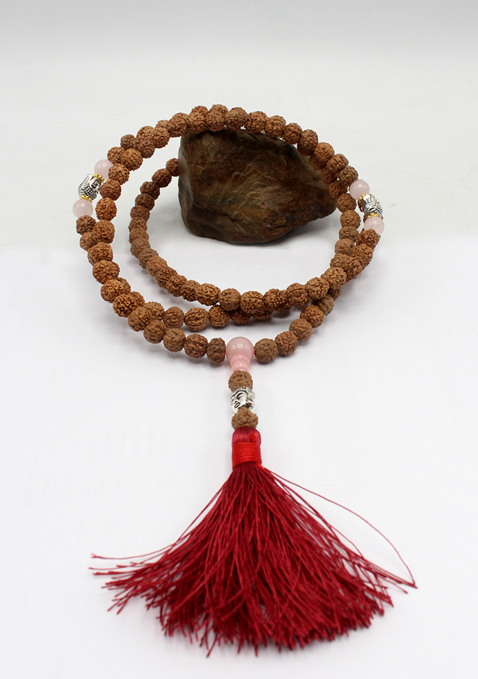 108 Rudraksha Mala with White Metal Buddha Spacer and Red Tassel