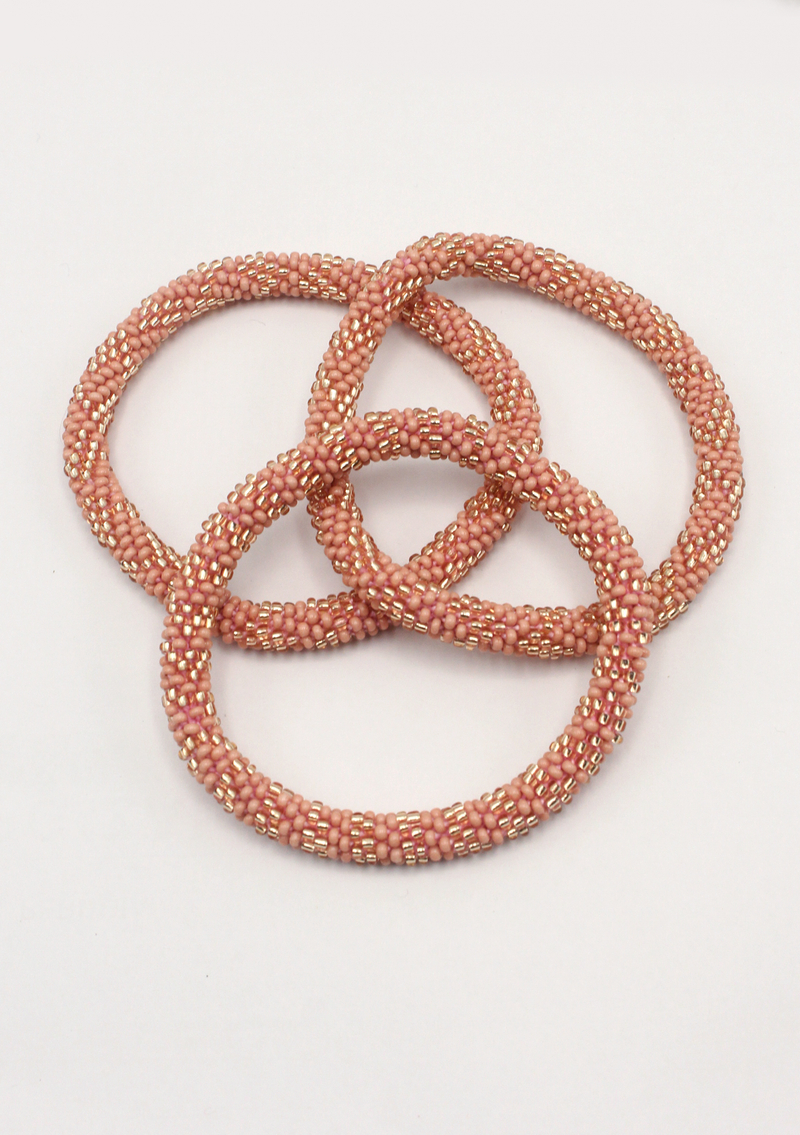 Pink Gold Roll on Beads Nepalese Bracelet