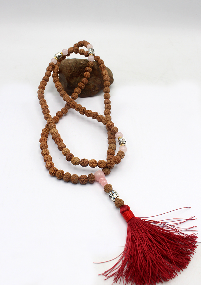 108 Rudraksha Mala with White Metal Buddha Spacer and Red Tassel