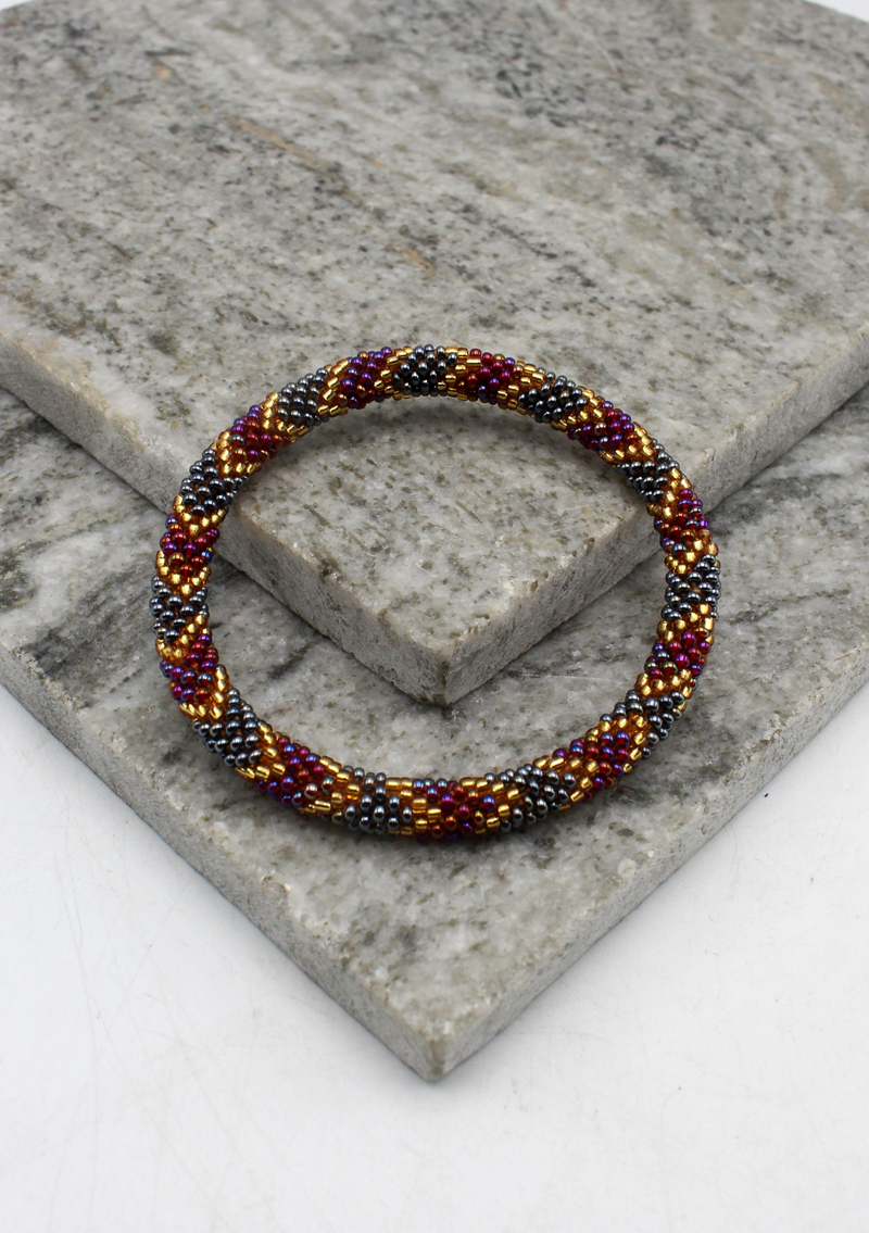 Dark Purple, Gold & Mixed Beads Nepalese Roll on Bracelet