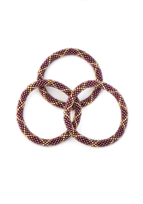 Deep Amethyst with Gold Nepalese Roll Bead Bracelet