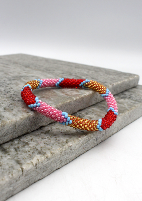 Red Pink Stripe Nepalese Roll on Beads Bracelet