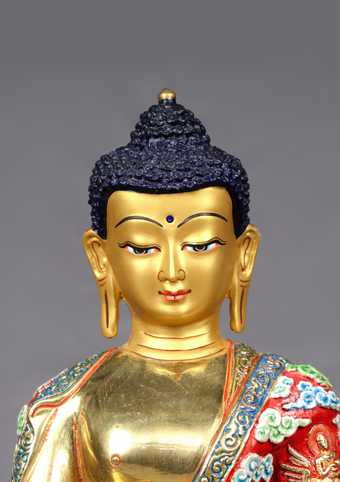 Close view of the Hand painted Shakyamuni Buddha Statue
