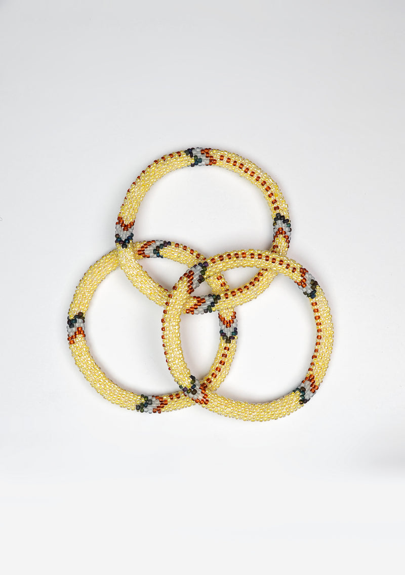 Golden Daisy Nepalese Roll Bead Bracelet
