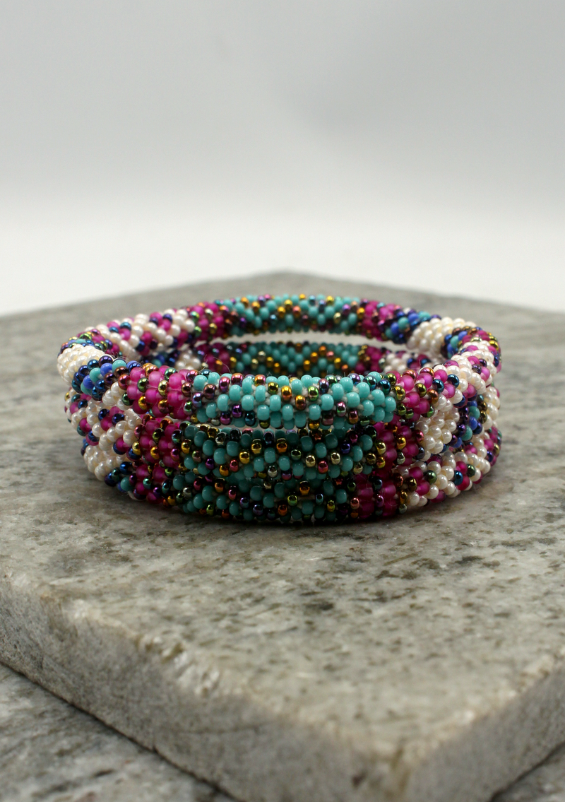 Aqua Blue Roll on Beads Bracelet