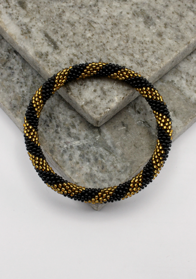 Black Gold Roll on Beads Bracelet