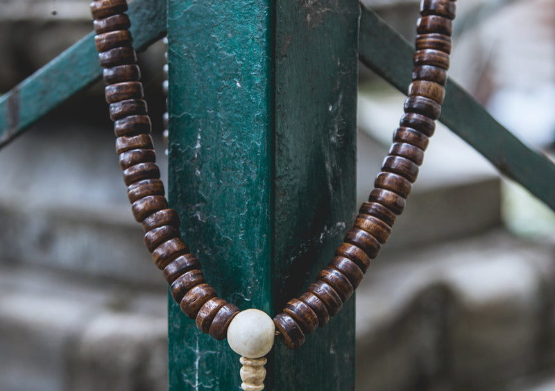 Disk Shaped Yak Bone Prayer Mala with White Conch Counter - nepacrafts