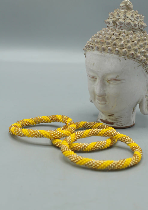 Bright Yellow and Golden Beads Nepalese Roll on Bracelet