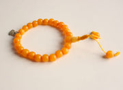 Faux Amber Wrist Mala with Buddha Charm - nepacrafts
