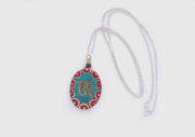 Oval Tibetan Kalachakra, Om and Buddha Eyes Pendant - nepacrafts