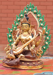Four Armed Goddess Saraswati Partly Gold Plated Statue with Frame - nepacrafts
