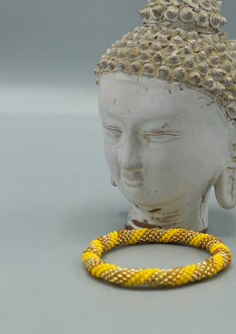 Bright Yellow and Golden Beads Nepalese Roll on Bracelet