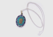 Oval Tibetan Kalachakra, Om and Buddha Eyes Pendant - nepacrafts