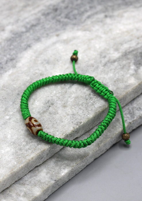 Dzi Bead on Green Lucky Knots Bracelet