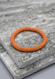 Bright Orange Glass Beads Roll on Bracelet - nepacrafts