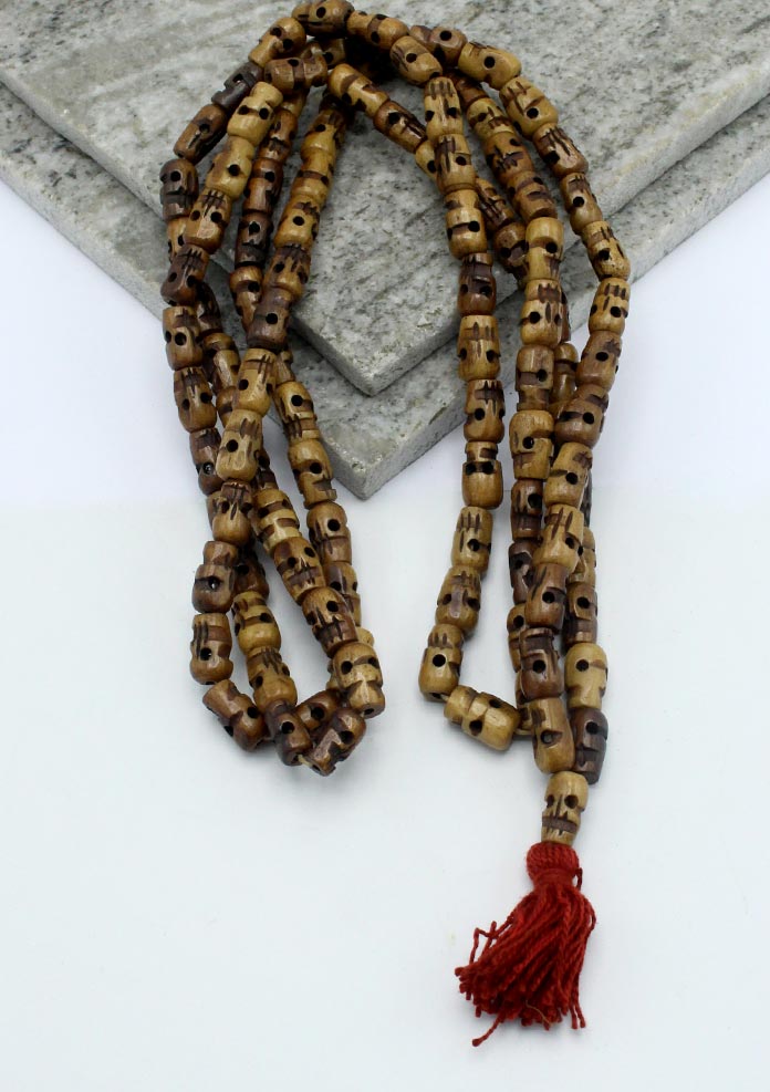 Brown Buddhist Skull Prayer Mala With Red Tassle