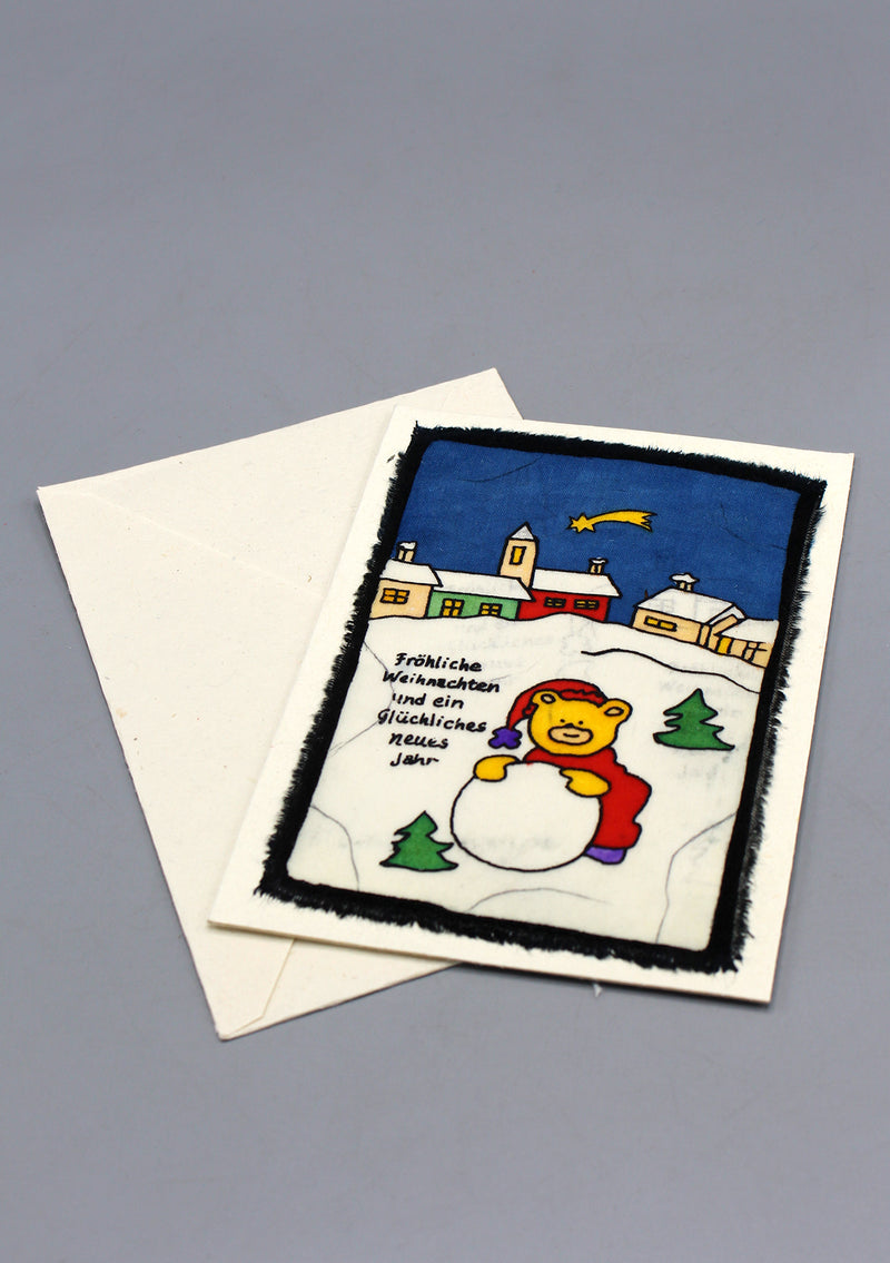 Fair Trade Batik Teddy Bear Playing with Snow BeerGreetings Card