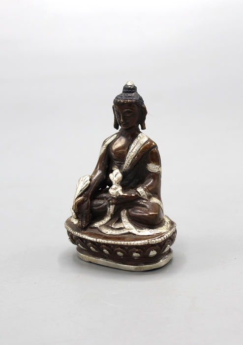 Copper Medicine Buddha Statue inlaid Silver Robes