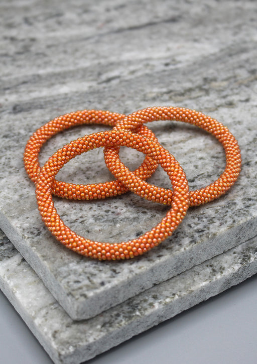 Bright Orange Glass Beads Roll on Bracelet - nepacrafts