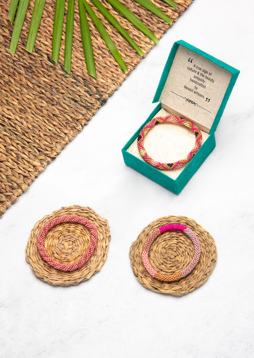 Fair Trade Nepalese Peach Pink Roll on Beads Bracelet Set