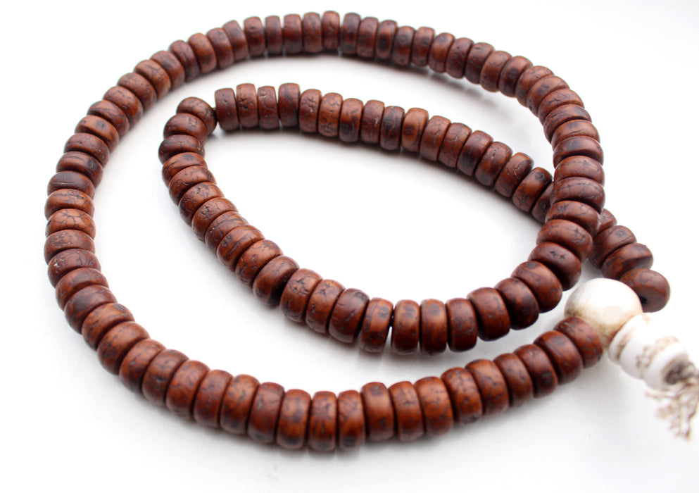 12 mm Flat Beads Cut Design Dark Brown Bodhi Seed Prayer Mala with Counch Guru Beads - nepacrafts