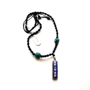 White Metal Lapis Inlaid Om Mani Pendant - nepacrafts