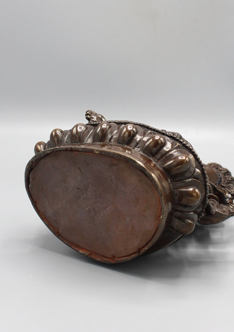 Copper Oxidized Four Armed Ganesha Statue