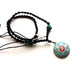 White Metal Round Tibetan OM Pendant with Turquoise Inlays - nepacrafts