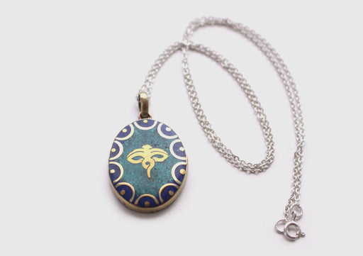 Oval Tibetan Kalachakra, Om and Buddha Eyes Pendant - nepacrafts