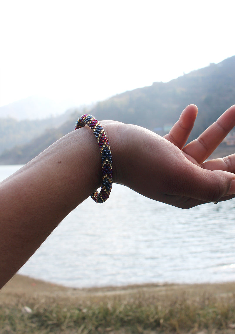 Dark Purple, Gold & Mixed Beads Nepalese Roll on Bracelet