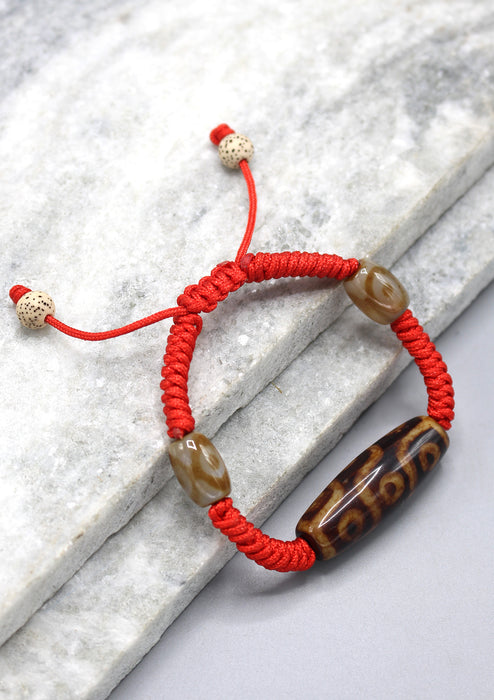 9 Eyes Dzi Bead on Lucky Knot Tibetan Bracelet
