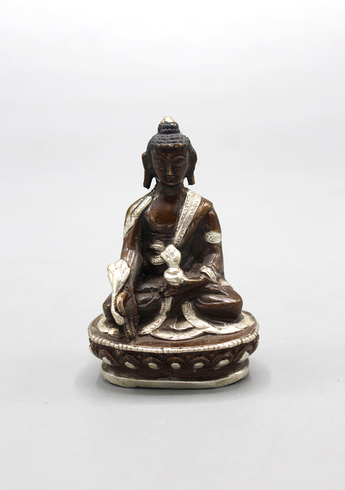 Copper Medicine Buddha Statue inlaid Silver Robes