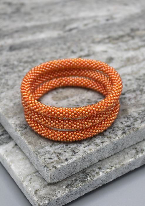 Bright Orange Glass Beads Roll on Bracelet - nepacrafts