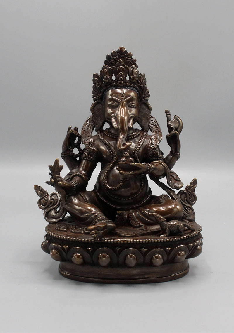 Copper Oxidized Four Armed Ganesha Statue