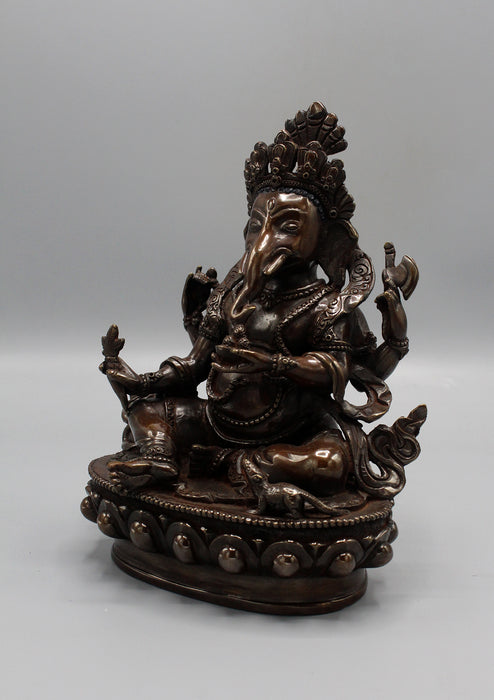 Copper Oxidized Four Armed Ganesha Statue