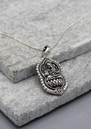 Lord Ganesh on Lotus White Metal Pendant - nepacrafts