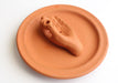 Hand on a Ceramic Base Plate Incense Holder - nepacrafts