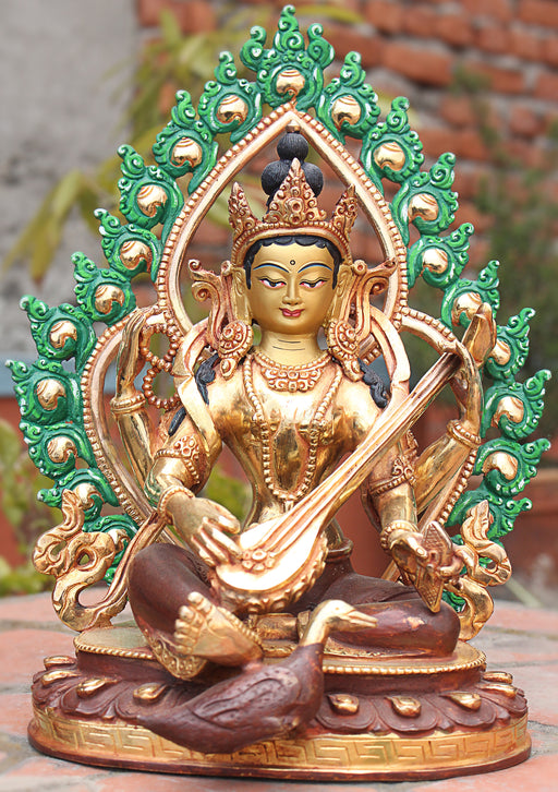 Four Armed Goddess Saraswati Partly Gold Plated Statue with Frame - nepacrafts