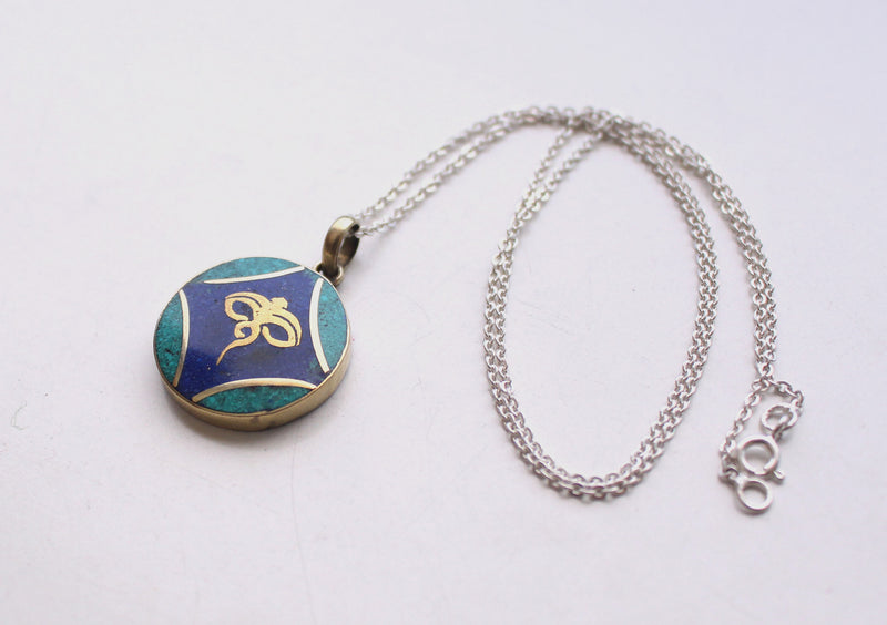 Round Tibetan Kalachakra, Om and Buddha Eyes Pendant - nepacrafts