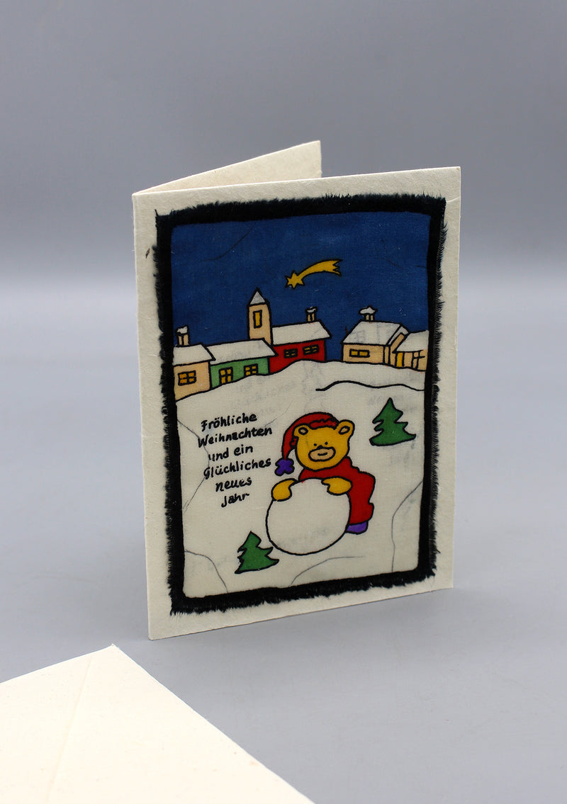 Fair Trade Batik Teddy Bear Playing with Snow BeerGreetings Card