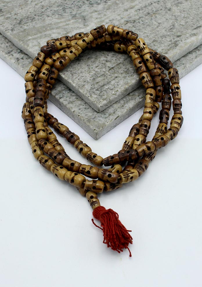 Brown Buddhist Skull Prayer Mala With Red Tassle