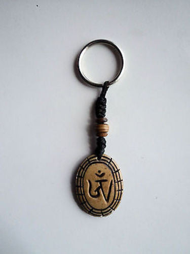 Brown Tibetan Om Bone Keychains - nepacrafts
