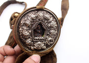 Round Hand Carved White Metal Manjushri Ghau Pendant with Cotton Cover - nepacrafts