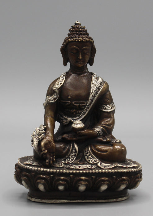 Finely carved Copper Medicine Buddha Statue inlaid Silver Robes - nepacrafts