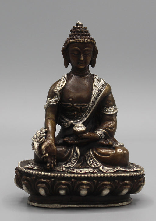 Finely carved Copper Medicine Buddha Statue inlaid Silver Robes - nepacrafts