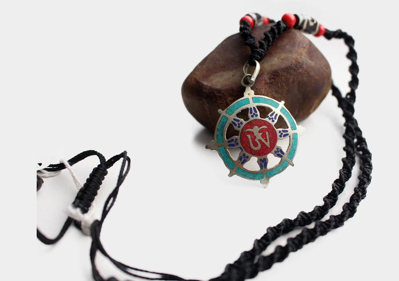 White Metal Tibetan Om Dharmachakra Pendant - nepacrafts