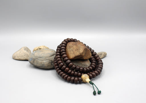 Cut Design Black Bodhi Seed 12 mm Flat Beads Prayer Mala with Counch Guru Beads - nepacrafts