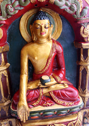 Creatively Hand Carved and Painted Ratnasambhava Clay Wall Hanging - nepacrafts