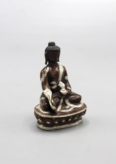 Copper Medicine Buddha Statue inlaid Silver Robes