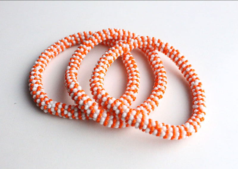 Jazzy Orange Roll Beads Bracelet - nepacrafts